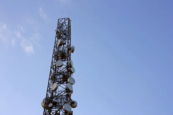 Cell phone transmitter antenna isolated over the sky. Horizontal — Stock Photo, Image