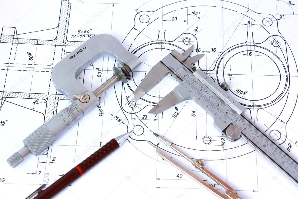 Micrometer, Caliper, Mechanical Pencil and Compass on Blueprint