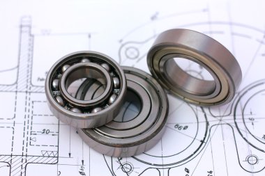 Ball bearings on technical drawing clipart