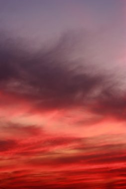 Abstract cloudy red Sunset scene background clipart