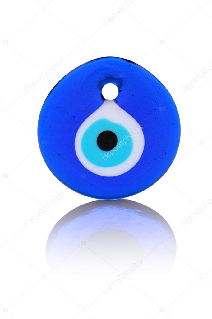 Evil eye bead (amulet) isolated on white background with reflection