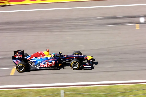 Sebastian Vettel team Red Bull på race - Stock-foto