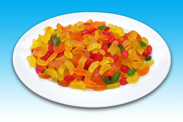 Narancs szelet egy tányér alakú zselés cukorka — Stock Fotó