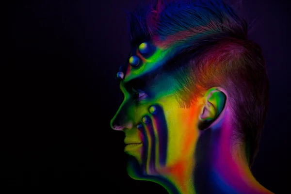 Człowiek z świetlówki ultrafioletowe — Zdjęcie stockowe