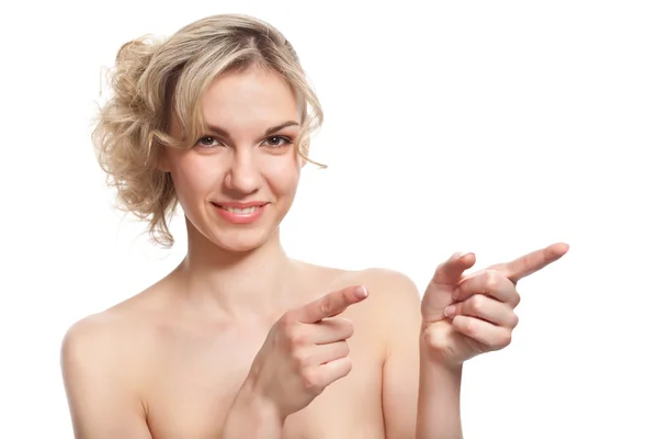 A woman is pointing to something — Stock Photo, Image