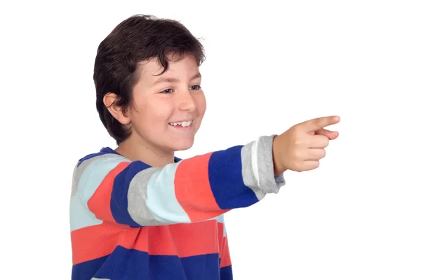 Bedårande pojke med en randig jersey pekar — Stockfoto