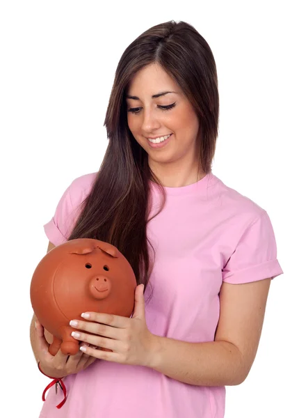 Menina atraente com um grande porquinho-banco — Fotografia de Stock