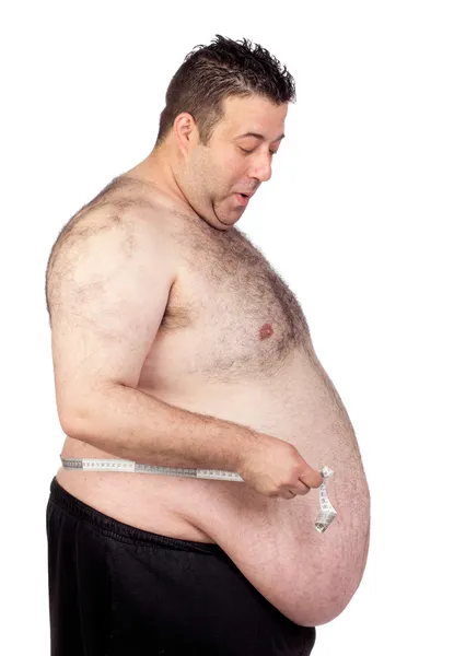 Uomo grasso sorpreso con un metro a nastro — Foto Stock