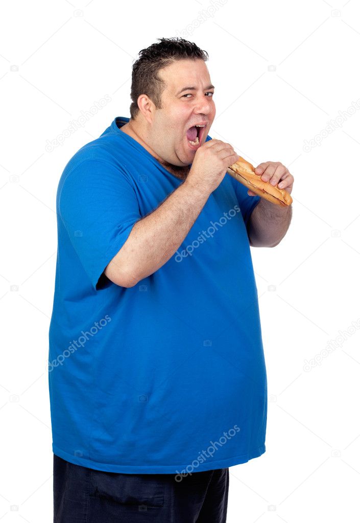 Happy fat man eating a large bread
