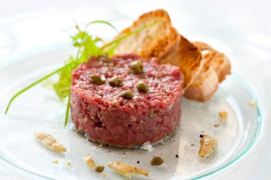 Beef tartar with capers clipart