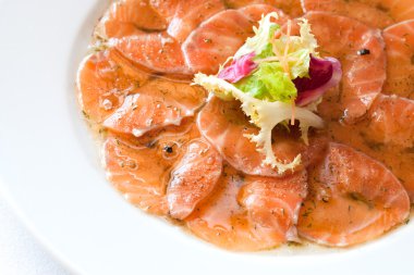 Macro close up of smoked salmon carpaccio. clipart