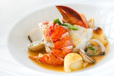 Seafood dish with lobster. clipart