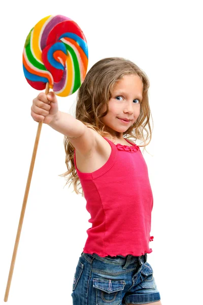 Linda chica sosteniendo caramelo stic . —  Fotos de Stock