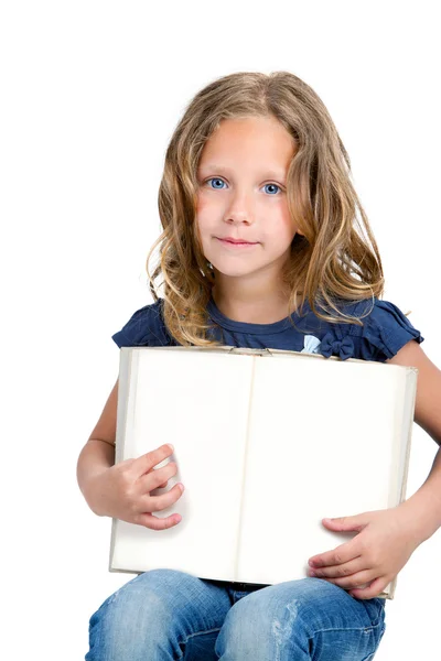 Nettes Mädchen zeigt mit dem Finger auf leeres Buch . — Stockfoto