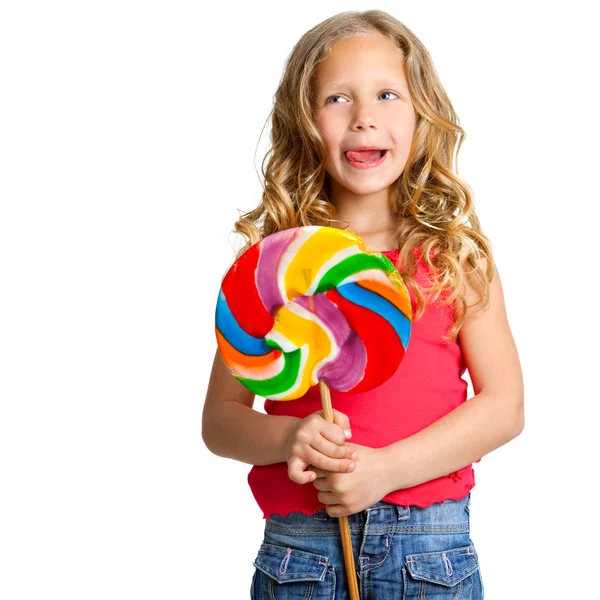 Porträt eines süßen Mädchens mit Süßigkeiten. — Stockfoto