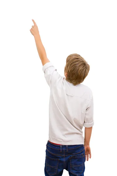 Pojke inför tillbaka pekar. — Stockfoto