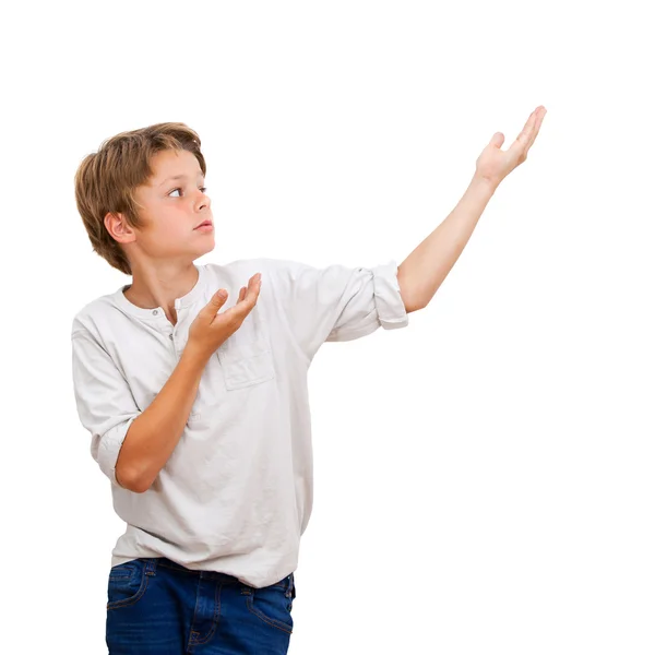 Jonge jongen wijzen met handen op kopie ruimte. — Stockfoto