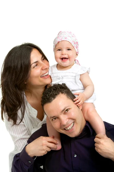 Happy young couple with their baby daughter. — Stock Photo, Image