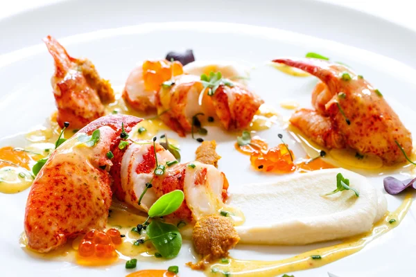 Lobster with caviar and seafood dressings. — Stock Photo, Image