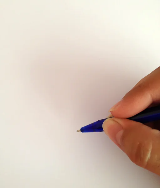 Ruka drží pero — Stock fotografie