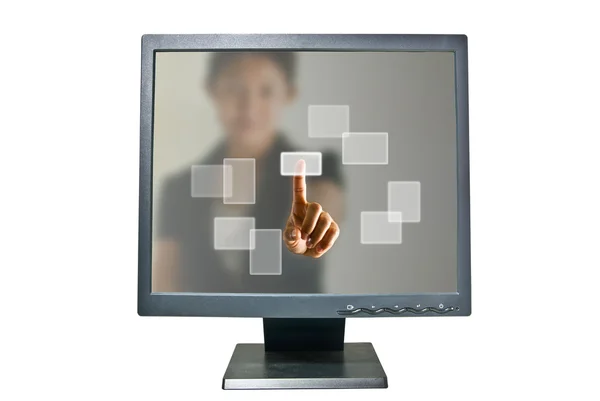 Деловая женщина в мониторе нажимает виртуальные кнопки — стоковое фото