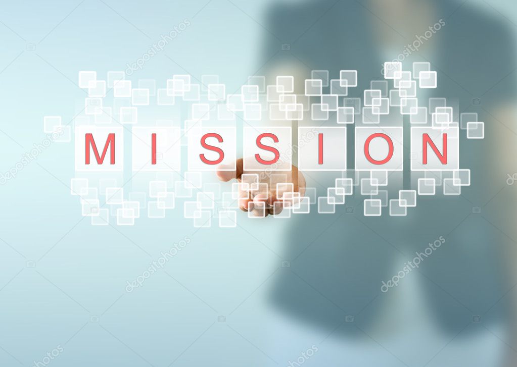 MISSION words on business woman hand