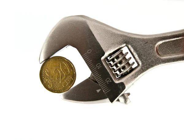 Euro coin with wrench — Stock Photo, Image
