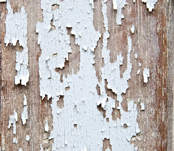 Pelar pintura sobre fondo de madera vieja — Foto de Stock