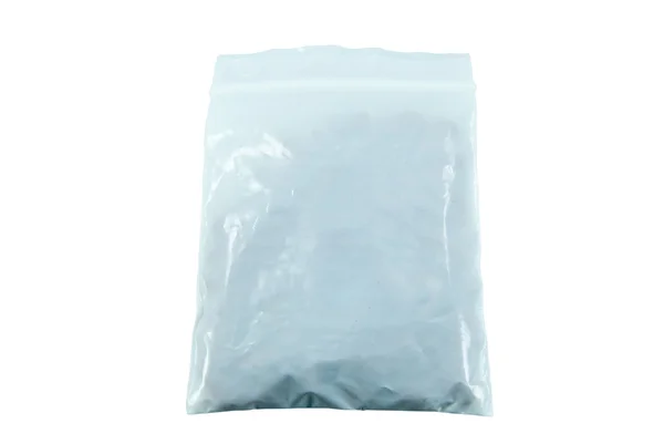 Paquete de plástico aislado sobre fondo blanco —  Fotos de Stock