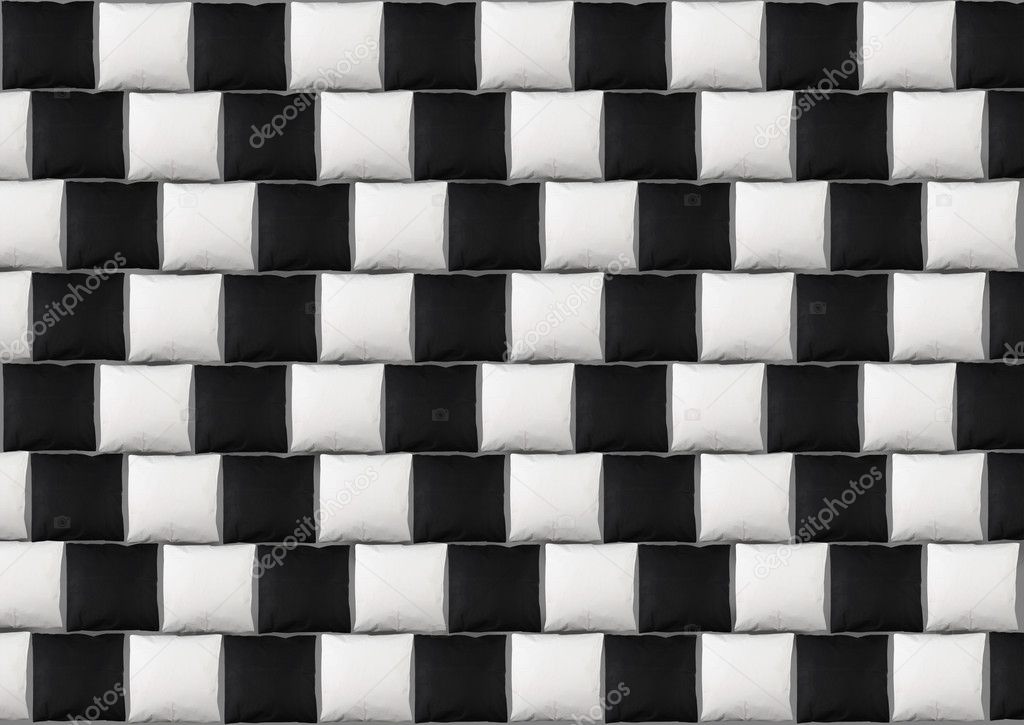 Optical illusion with black and white pillows