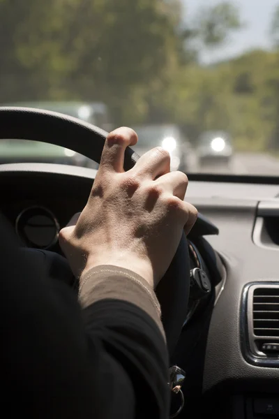 stock image Hand on steering wheel