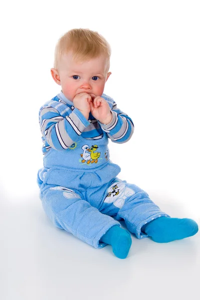 A small child his hands to his mouth — Stock Photo, Image