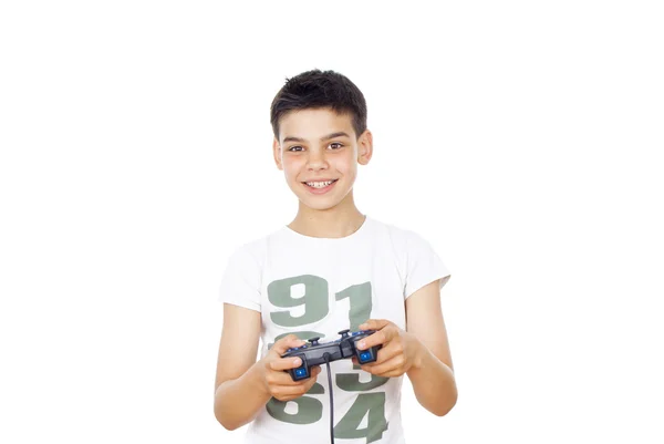 Мальчик играет в компьютерные игры на джойстике — стоковое фото