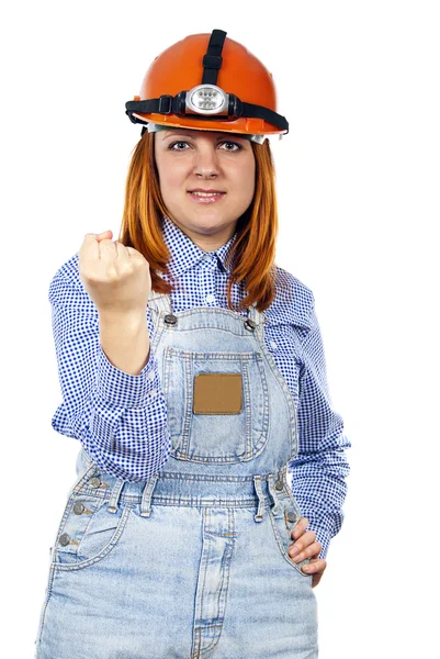 Builder girl waving a fist — Stock Photo, Image