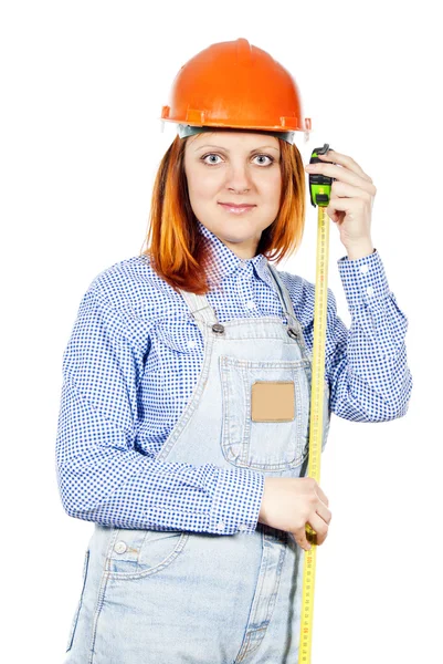 Chica de la construcción con cinta métrica aislada —  Fotos de Stock