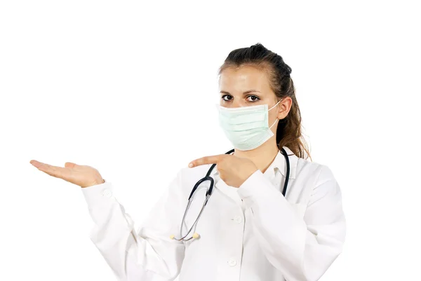 Lekarz w masce wskazuje ręką na białym tle — Zdjęcie stockowe