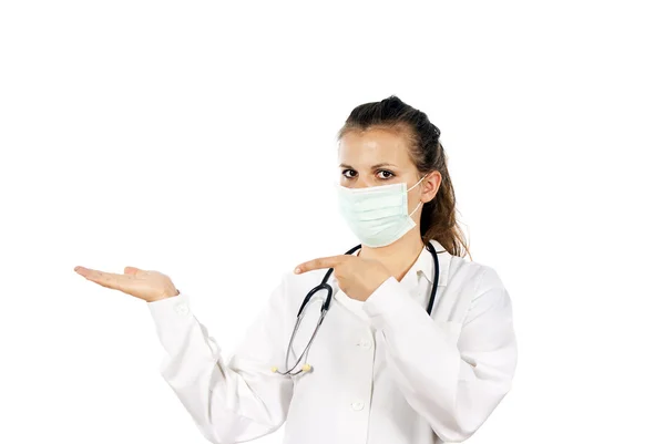 Läkare i masken anger handen — Stockfoto