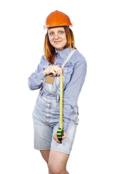Girl in a helmet with a tape measure — Stock Photo, Image