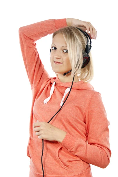 Dziewczyna pozuje ze słuchawkami — Zdjęcie stockowe