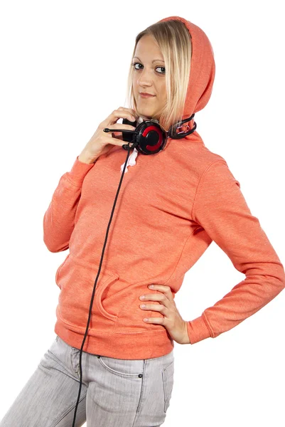 Girl with headphones stands — Stock Photo, Image
