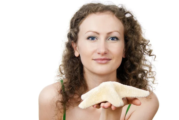 Portrait of a beautiful girl with the starfish — Stock Photo, Image