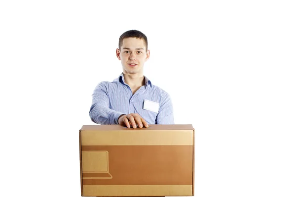 Vendedor mantém uma caixa de equipamentos — Fotografia de Stock