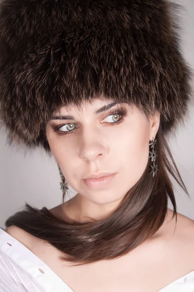 stock image Girl in a fur hat