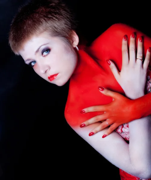 Dívka s červenou kůží — Stock fotografie