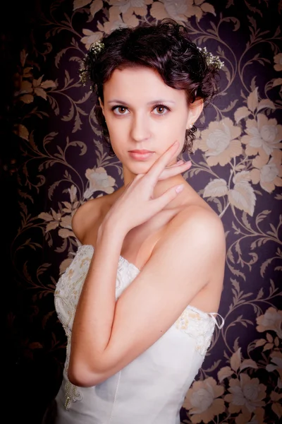Beautiful girl in a white wedding dress — Stock Photo, Image