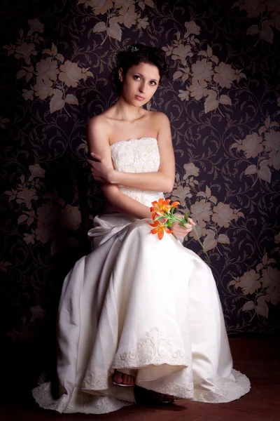 Beautiful girl in a white wedding dress — Stock Photo, Image