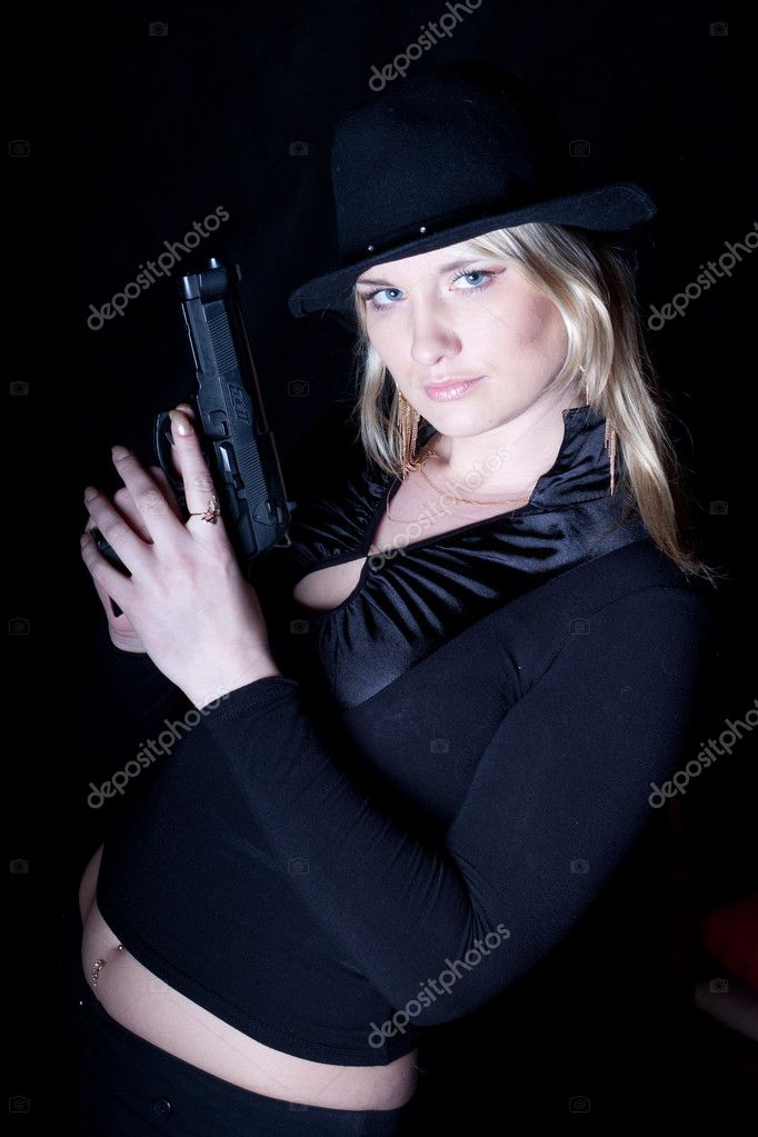 Gangster girl with a gun — Stock Photo © Ahersolda1 #11558016