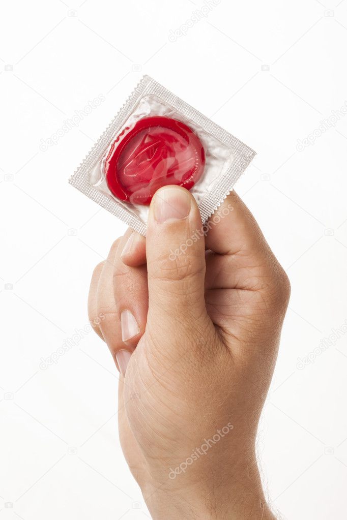 Hand with condom