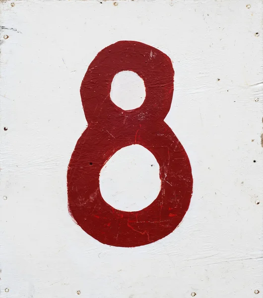 Number eight on white plywood background — Stock Photo, Image