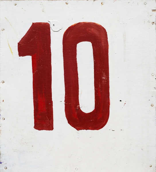 Number nine on white plywood background — Stock Photo, Image